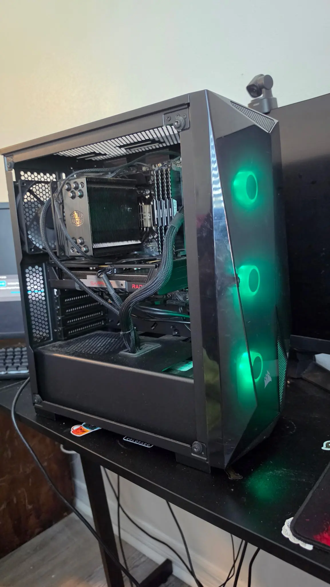 Front angled view of Tre Howell's custom PC build with green front fans